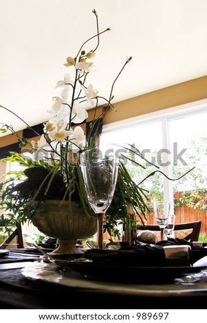 Dining table decorated with flowers