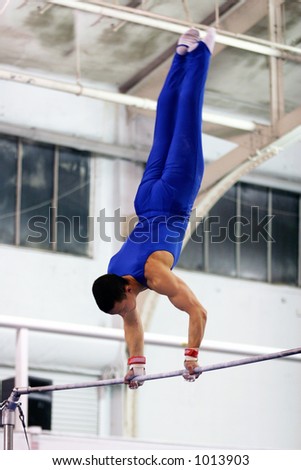 Gymnast competing on high bar