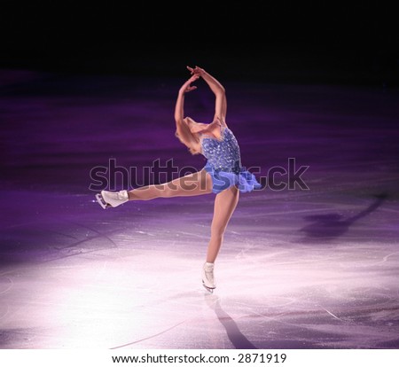 Professional woman figure skater performing at Stars on ice show