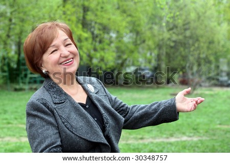 Portrait of a laughing woman in her seventies