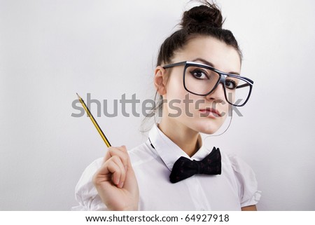 Woman scientist, professor or student with dorky glasses and pencil, pointing to copy space