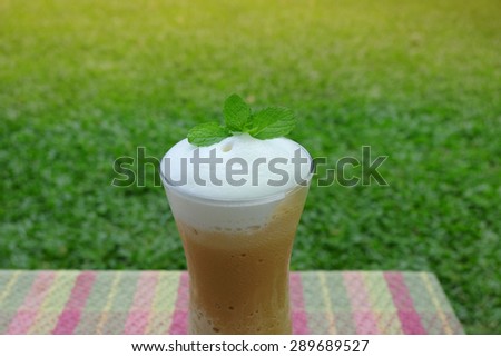 Iced coffee blend with milk foam
