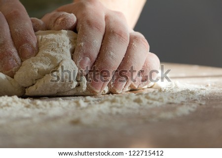 fingers on dough