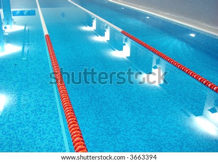 sport swimming pool  with path lanes and blue water  (from left)