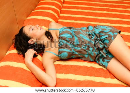 Woman Sleeps on Bed
