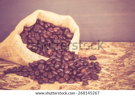 Coffee beans in a bag with filter effect retro vintage style