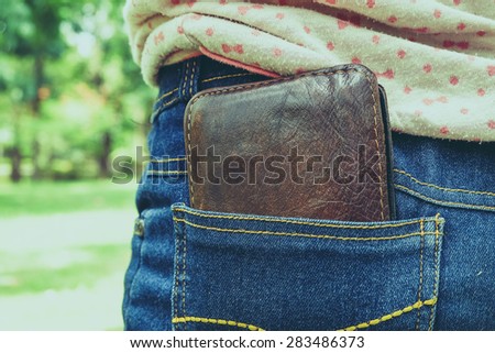 wallet in back pocket  with filter effect retro vintage style
