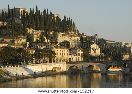 Verona, northern Italy.  View of city and river in afternoon sunlight.  Room for text on upper right