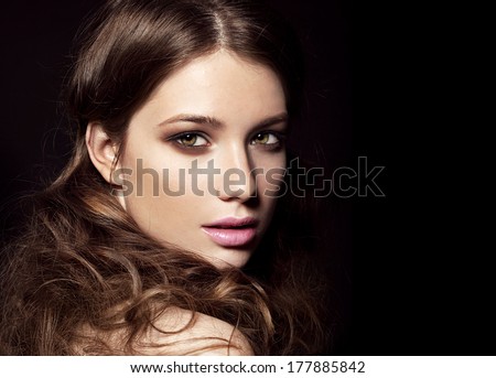 Beautiful young model with bright makeup and  Evening make up, night