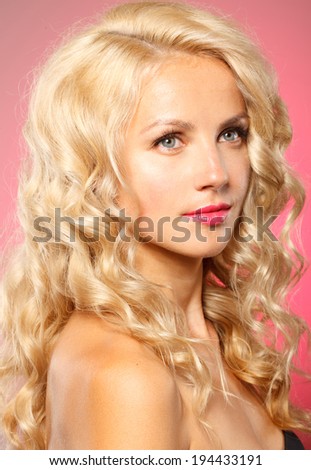 Fashion model with blonde curly hair , spring look,