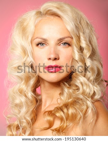 Fashion model with blonde curly hair , spring look,