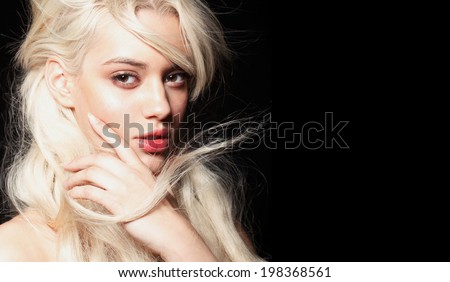 fashion young model with big lips, beauty make up, black background, party