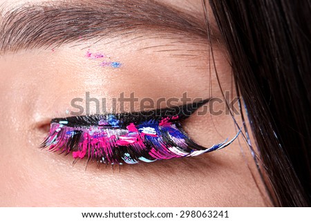 Eye Makeup. Beautiful Eyes Glitter Make-up. Holiday Makeup detail. False Lashes Colors.