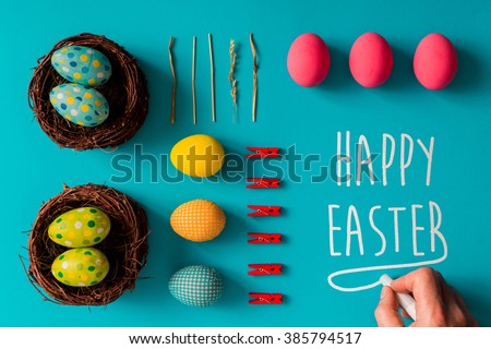 Flat lay of Easter eggs on blue background