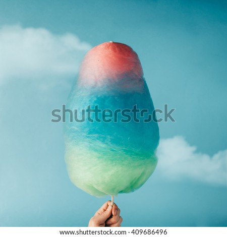 Cotton candy on sky background. Summer concept.