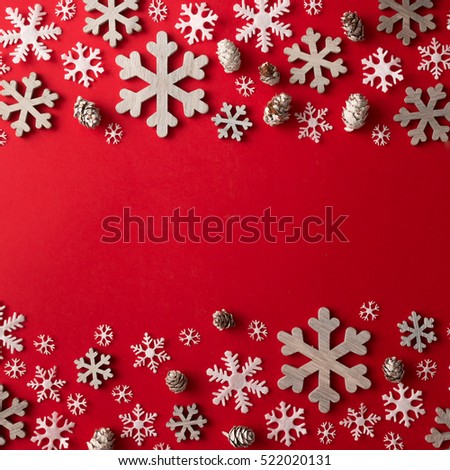 Creative arrangement of Christmas decoration on red background. Holiday concept. Flat lay.