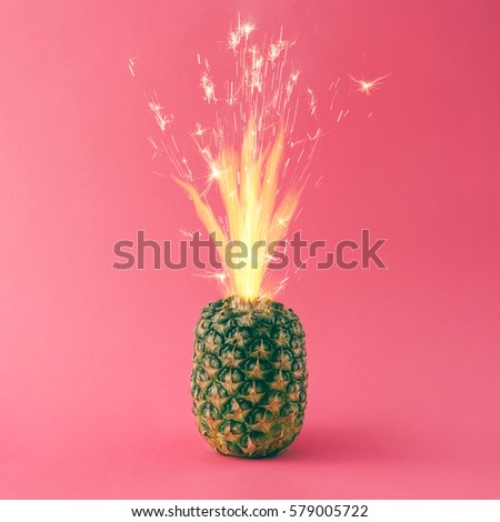 Pineapple with party cake sparkles. Minimal food concept.
