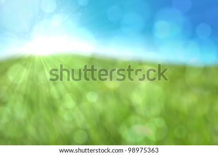 Spring or summer abstract nature background with glitter, bokeh and sun