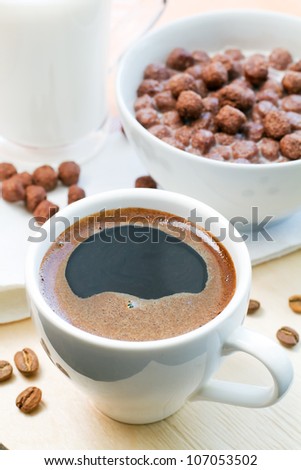 coffee and chocolate flakes with milk for a breakfast