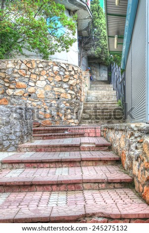 RUSSIA, CRIMEA - May 09.2009: Staircase between the apartment buildings in the village of Gaspra