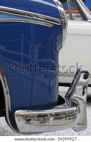Right front of 60s car with chrome bumper