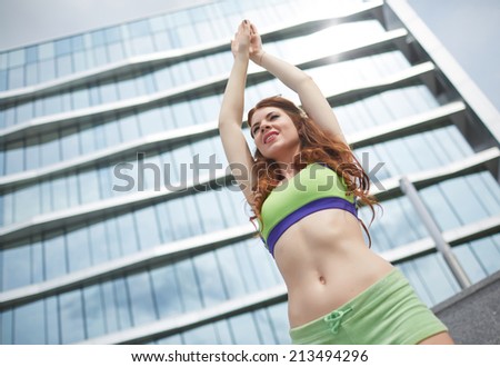 one woman sports at the street