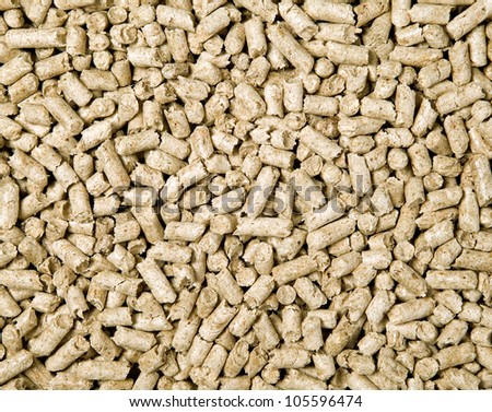 There are many shredded brown wood pellets