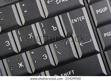 There is a black keyboard of laptop