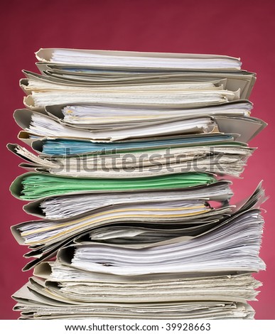 There are documents and papers on red background