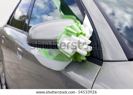 stock photo Colorful flowers on grey car decoration for wedding transport