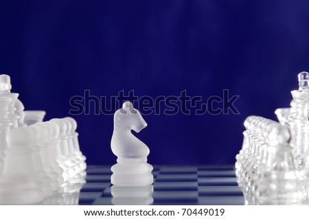 Game for leisure chess with figures on blue background
