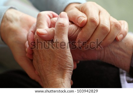 two pairs of hand touch each other, together, helping hands