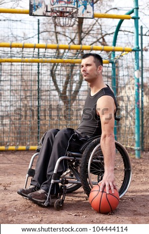 wheelchair users in sports, with wheelchair, strong man