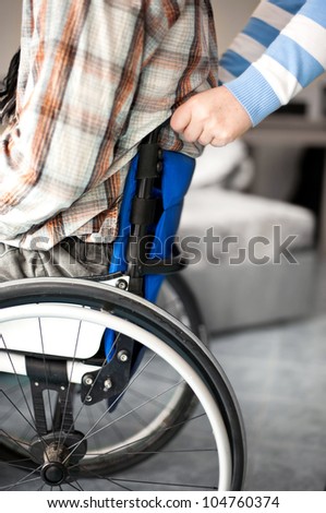 aid for a wheelchair user, care in the family, mobility despite disability