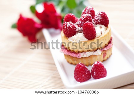cake with raspberries, small tarts, sweet dessert