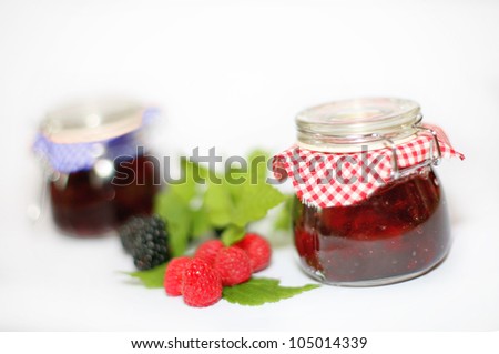 raspberry jam and blackberry jam,\
red and black