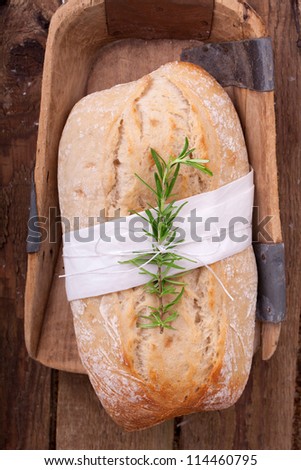 Fresh Ciabatta (Italian bread) on an old wooden shovel on top ciabatta bread ready for sale