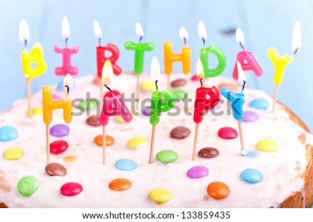 birthday cake, happy birthday candles on a colorful cake