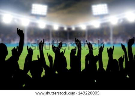 Football Fans Cheering In The Soccer Stadium