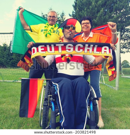 international Soccer fans supported their Teams, cheering fans from Germany, brazil and netherlands
