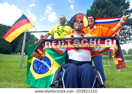 international Soccer fans supported their Teams, cheering fans from Germany, brazil and netherlands