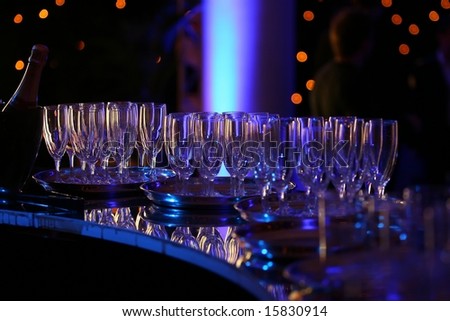 Champagne glasses on a bar counter