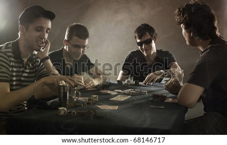 4 guys playing poker