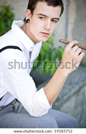 man thinks while smoking cigar