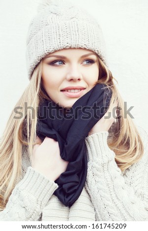 Beautiful Blonde Girl Wrapping Up In A Scarf, Funny Facial Expression