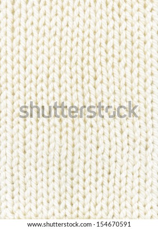 White Knitted Background. Texture-Knitted-Pigtail.