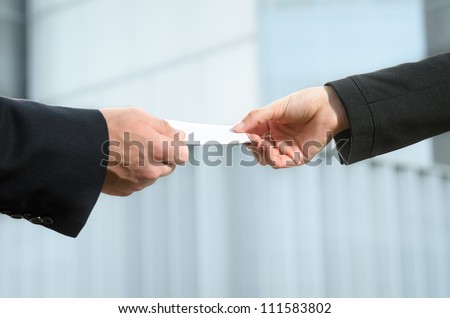 Exchanging business card. Corporate concept.