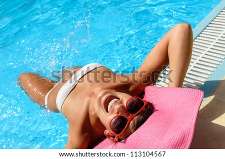 Happy fun woman face at pool on summer. Caucasian playful woman in white bikini on summer vacation