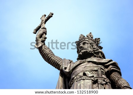 Monument to king Don Pelayo in Gijon, Asturias, Spain. Bronze statue of warrior king holding cross after the battle.