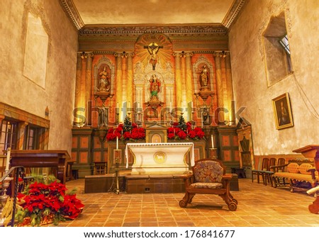SANTA BARBARA, CALIFORNIA--DECEMBER 26, 2013  Cross Mary Statue Altar Mission Santa Barbara California on December 26, 2013.  Mission founded in 1786.